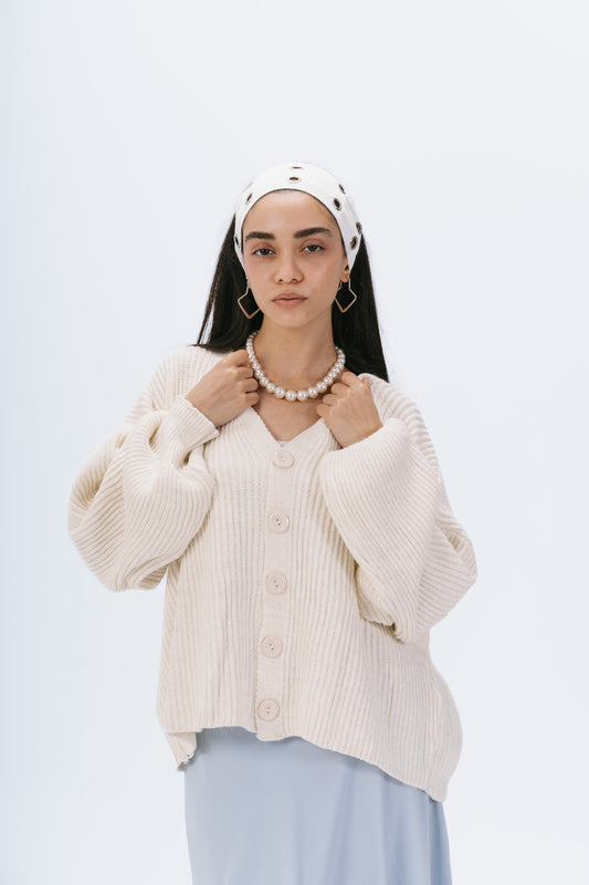 the oversized cable-knit buttoned cardigan